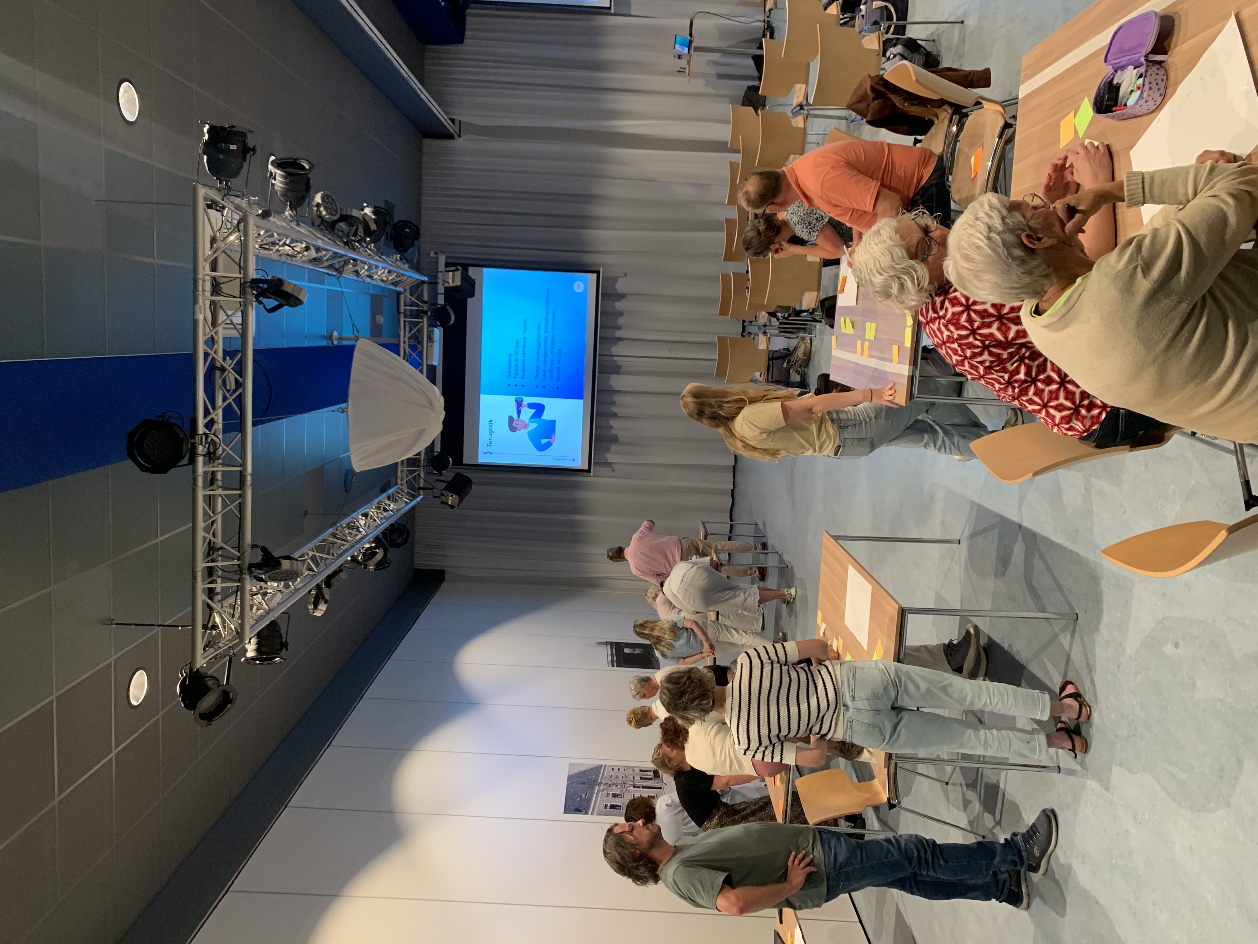 Leidinggevenden van TriVia in de zaal tijdens de terugkomdag op 8 september 2026